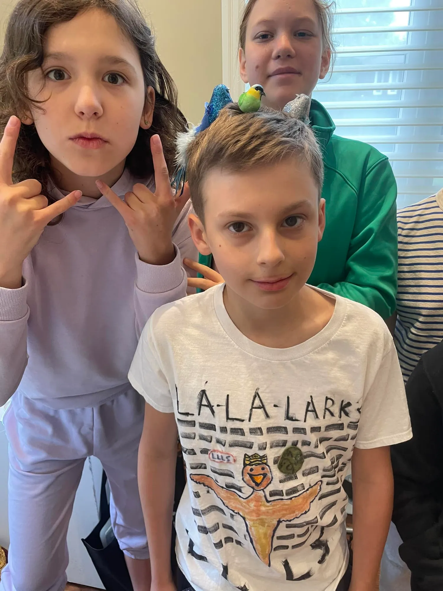 Children decorating instruments at La La Larks