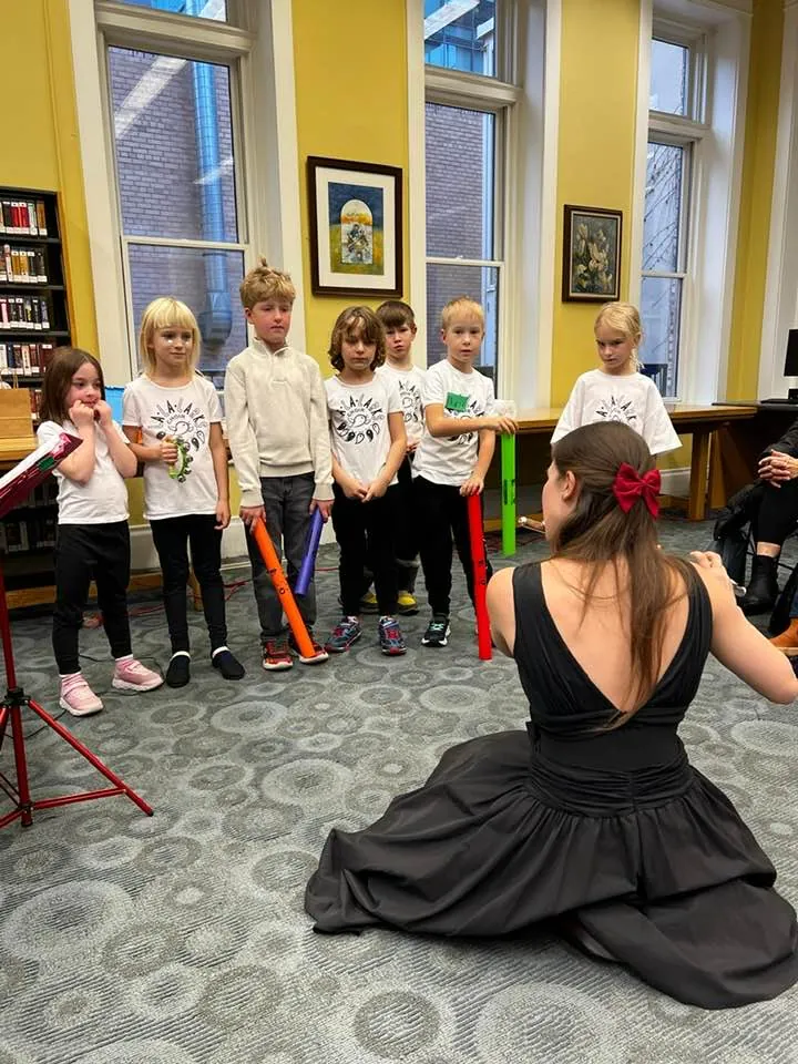 La La Larks and Ave Choir at the library