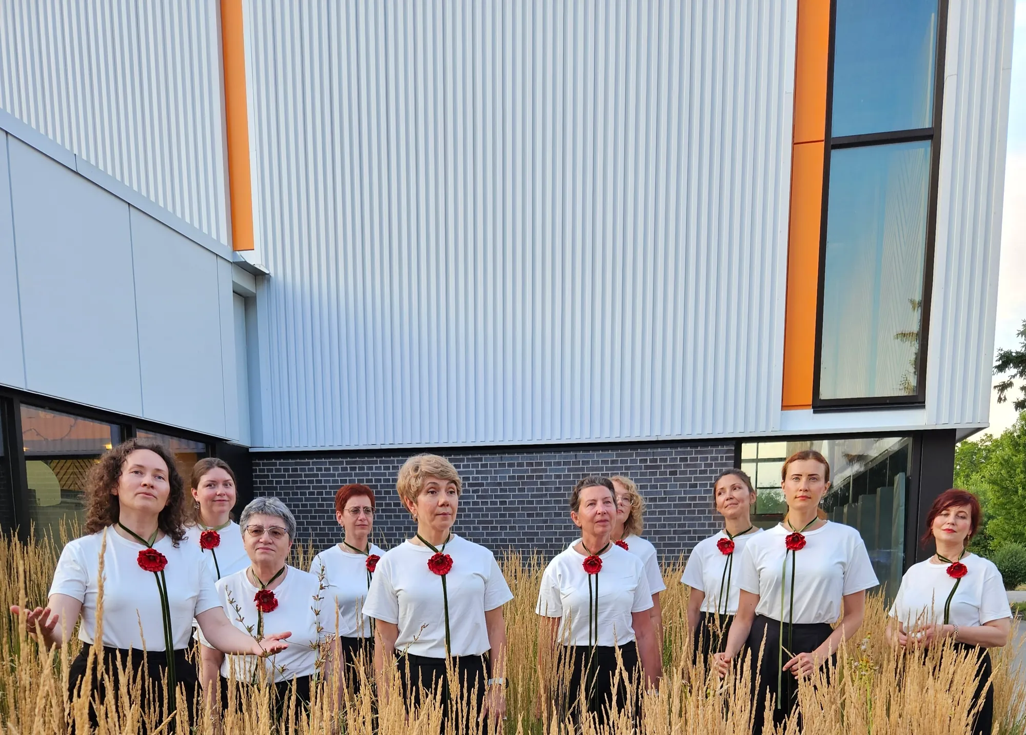 The Sunday Singers Choir gathered outside the Canadian Clay and Glass Gallery building